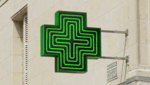 A green cross symbolizes a pharmacy in much of the world. 