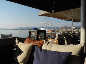 The seaside cafes in Nafplio come with comfortable couches for seating. Photo by Clark Norton