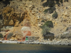 Colorful cliffs form a dramatic backdrop to Paliochori beach on Milos. Photo by Clark Norton 