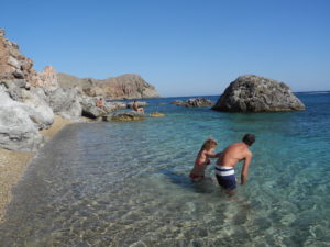 Swimmers at Paliochori Beach, Milos. Photo by Clark Norton 