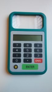 The Tip 'n Split, calculator and magnifier in one compact motif