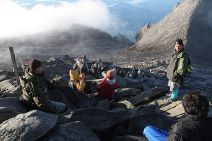 These Kinabalu climbers managed to keep their clothes on at the summit. Photo by Eric BC Lim on flickr. 