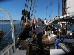 Hoisting the sails on the Nathaniel Bowditch. Photo by Clark Norton