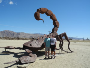 A giant scorpion poised to attack two sightseers. Photo by Catharine Norton. 