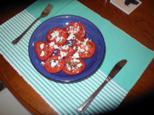 An early breakfast -- tomatoes and feta cheese sprinkled with local olive oil and oregano. Photo by Clark Norton, food styling by Catharine Norton