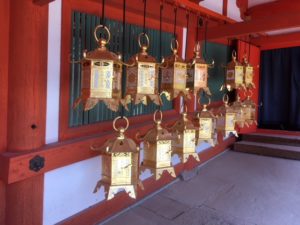 Gold lanterns light the way in one of Nara Park's many shrines. 