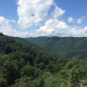 View of the Blue Ridge Mountains from atop Crabtree Falls. Photo by Lia Norton