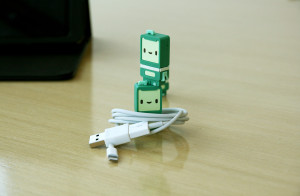 The white RYO adapter and the green Kushi flash drive, offered as prizes for donations.  Photo from RYO Technology.