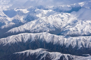 Maybe you could travel to the snow-capped Southern Alps in New Zealand. Photo by Dennis Cox/WorldViews