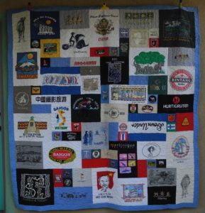 My travel T-shirt quilt made by Too Cool T-shirt Quilts. Photo by Catharine Norton.