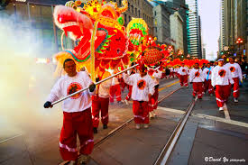 Chinese New Year parade features the dragon dance.