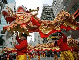Chinese New Year parade features the dragon dance.