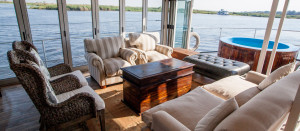 The upper deck lounge area with a view on one of the Chobe Princesses.  Photo from Mantis. 