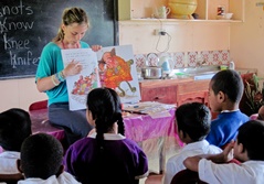 Projects Abroad volunteer teaches reading in Fiji. Photo from Projects Abroad. 